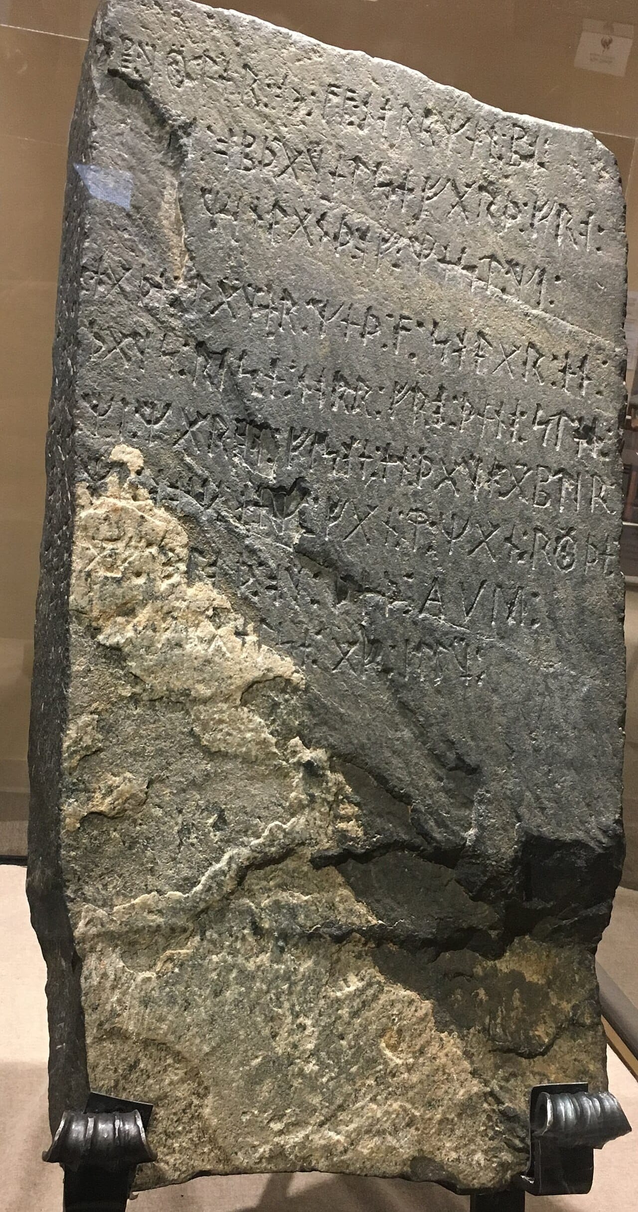 The Kensington Runestone, found in Minnesota in 1898, bearing runic inscriptions including the Hooked X symbol that also appears in Christopher Columbus's personal signature