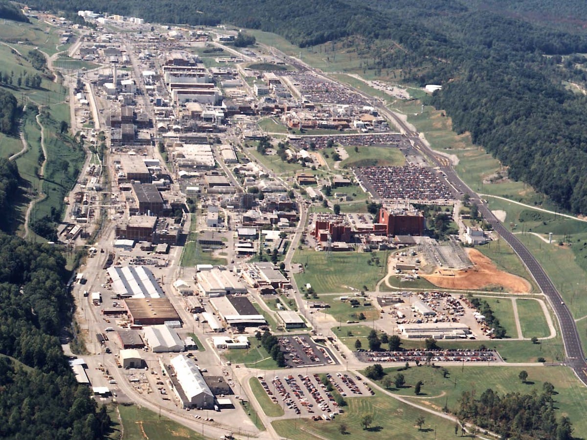 Archival photograph of workers at the Oak Ridge Y-12 facility during the Manhattan Project, where uranium separation took place under wartime secrecy