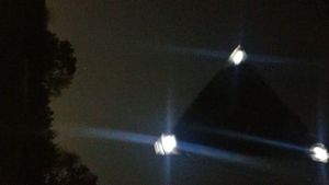 Silent Triangle Craft Hovers Over Car on Mississippi Highway