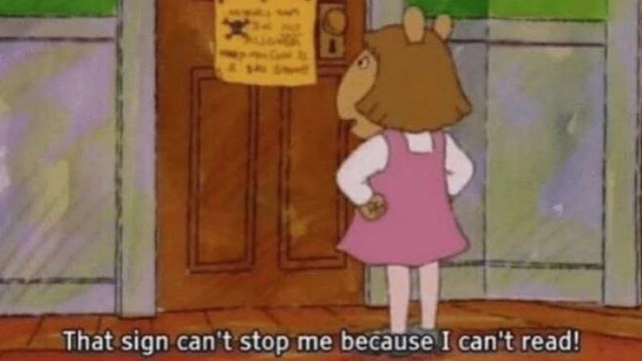 D.W from the show "Arthur" looking at a sign, with caption "That sign can't stop me because I can't read!"
