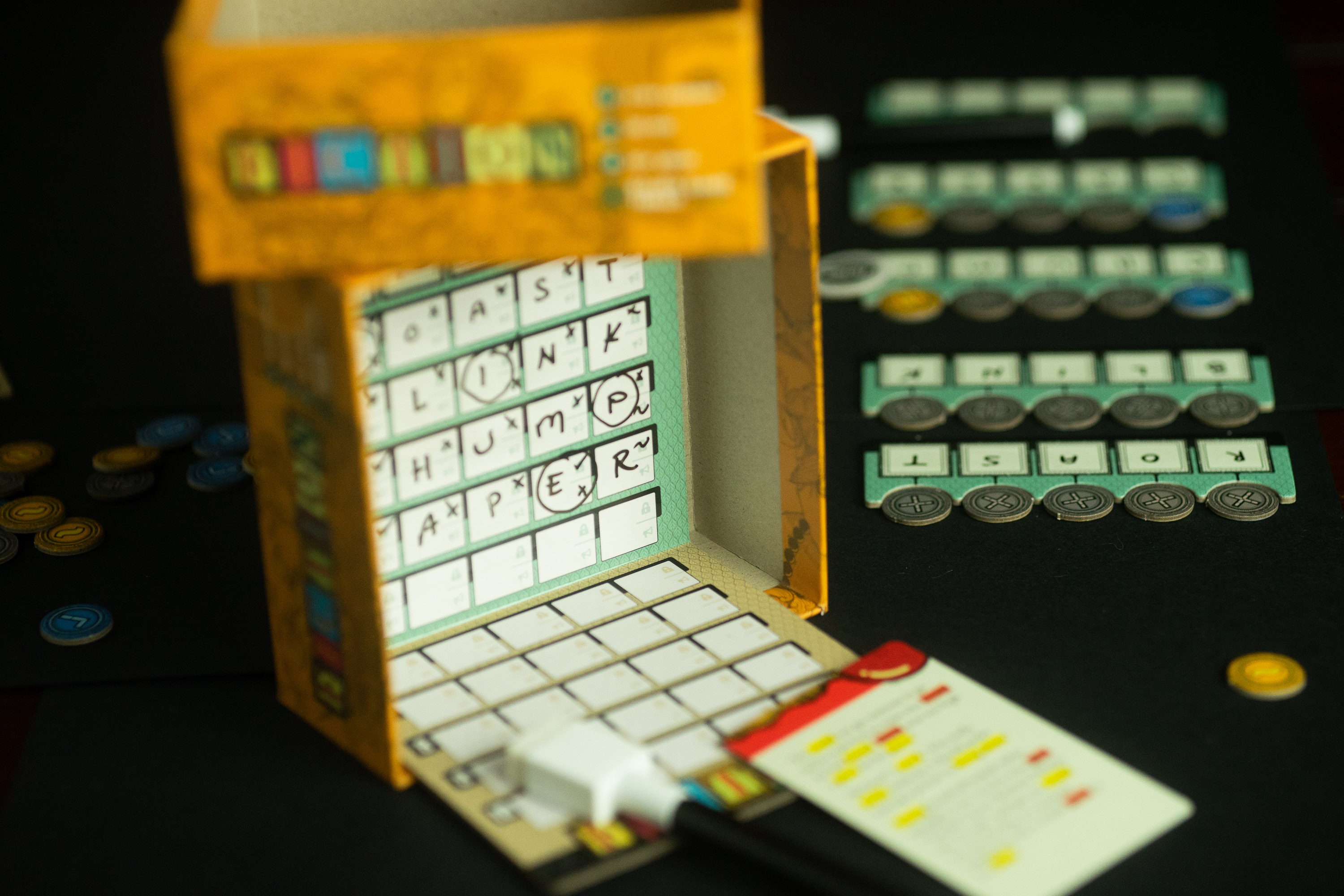 The board game Fiction being played at a table.