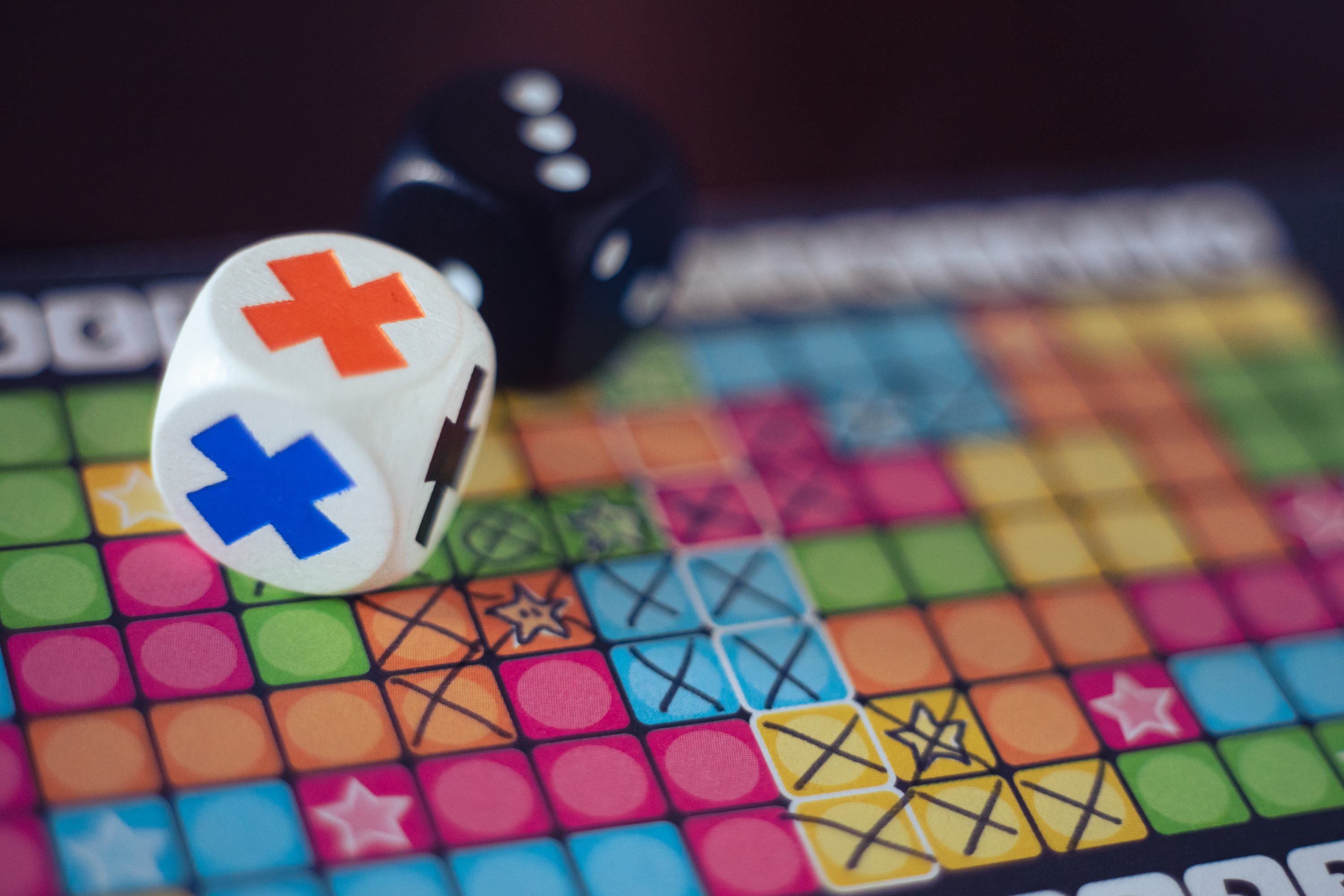 Dice and a player sheet from the board game Encore!