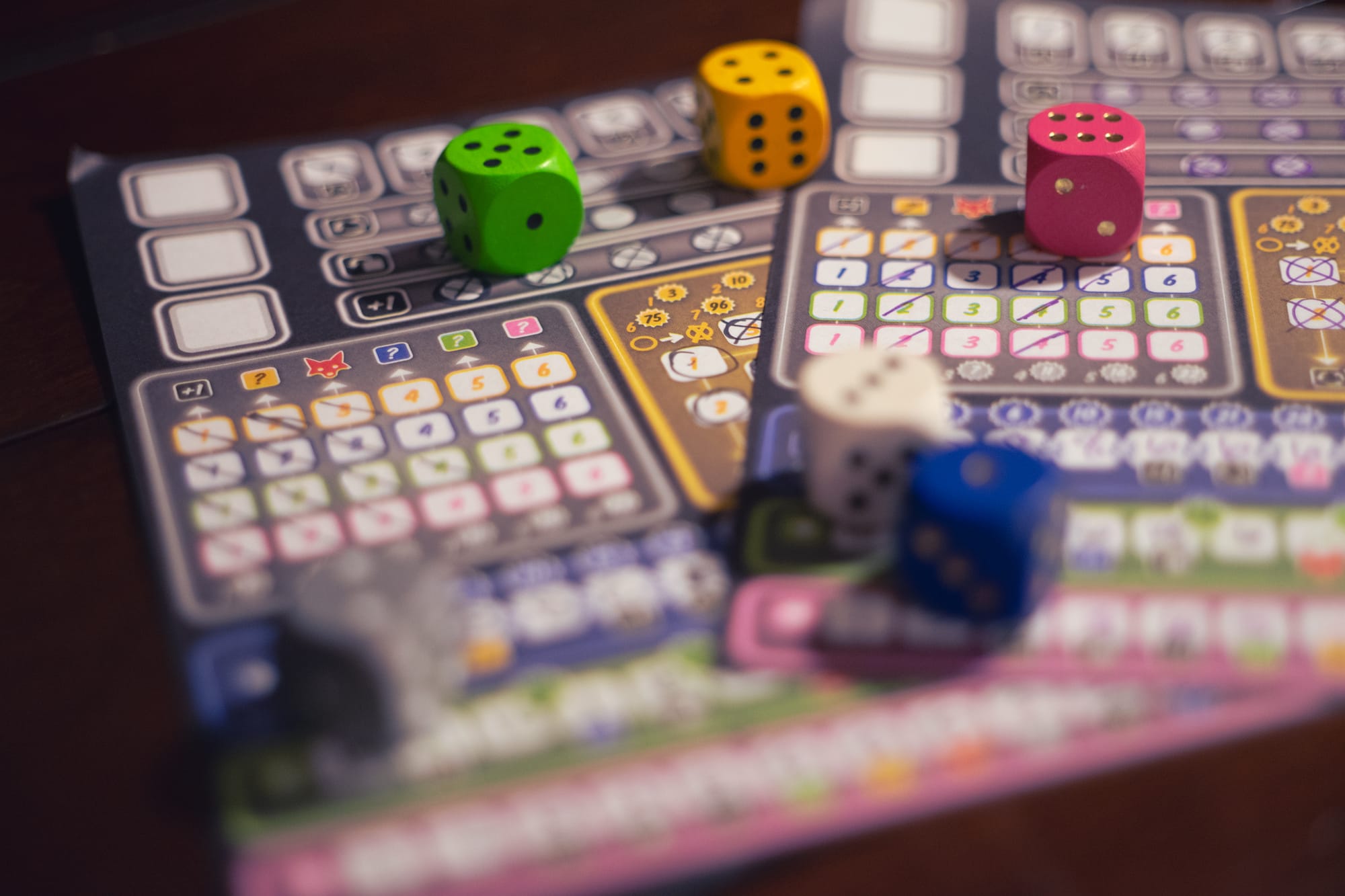 Dice and player sheets for the game Twice as Clever!