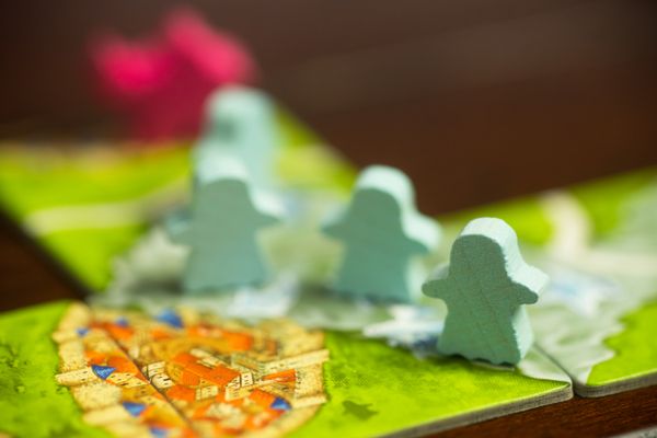 Mists Over Carcassonne is a cooperative spin on the classic