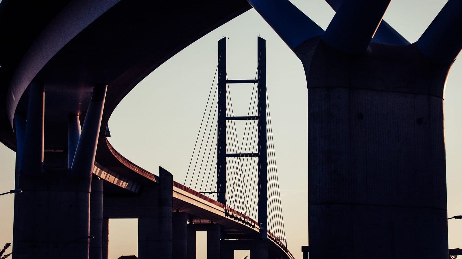 Modern bridge architecture illustrating the safe, transparent passage of tokenized information through a unified payment stack.