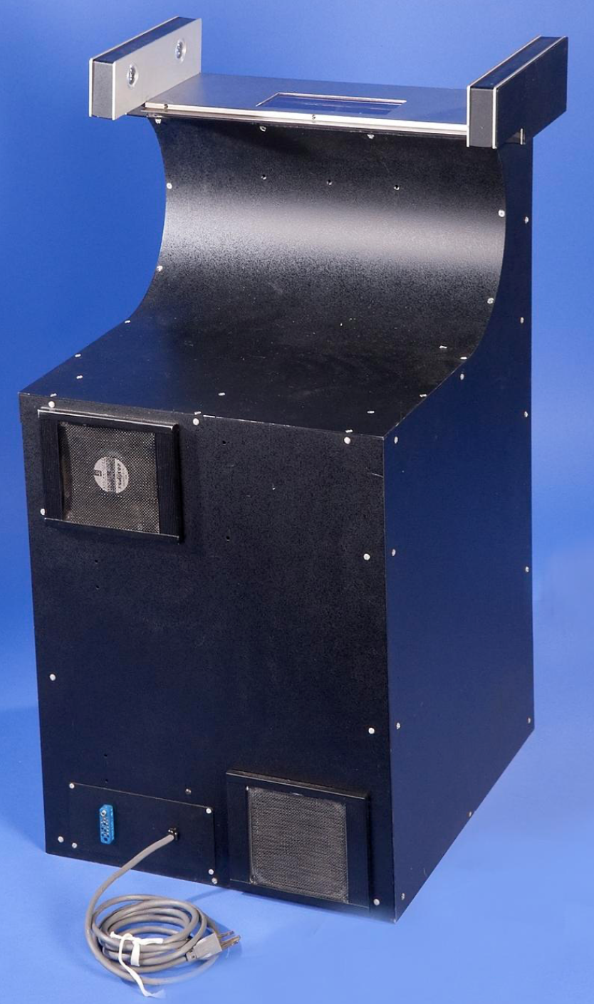 Photograph of an early supermarket barcode scanner, a black Spectra Physics model with a glass scanning surface, from the Smithsonian’s National Museum of American History.
