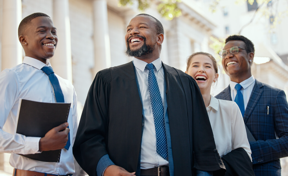 Shot of a group of lawyers standing in the city