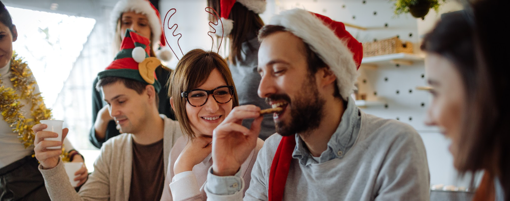 Diverse holiday party with people eating