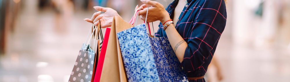 Young woman after shopping in the mall.