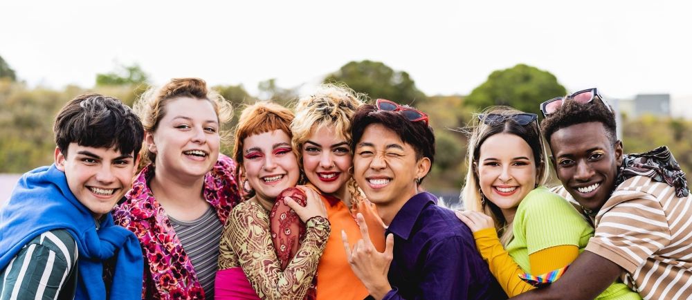 Diverse youth pose for a group picture
