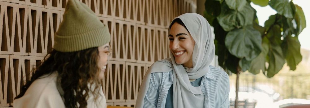 An inclusive leader welcomes a new employee during the onboarding process