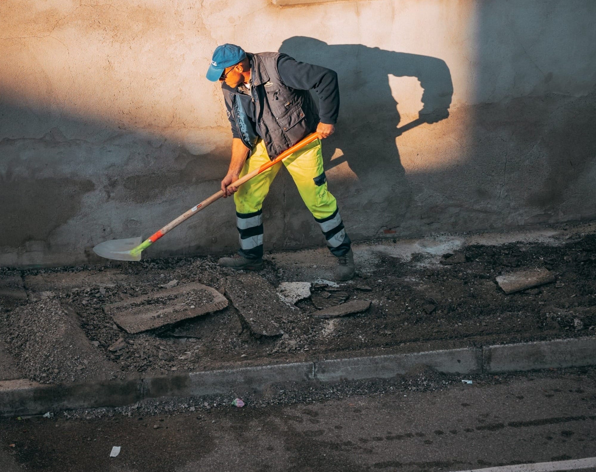 a person sweeping the street