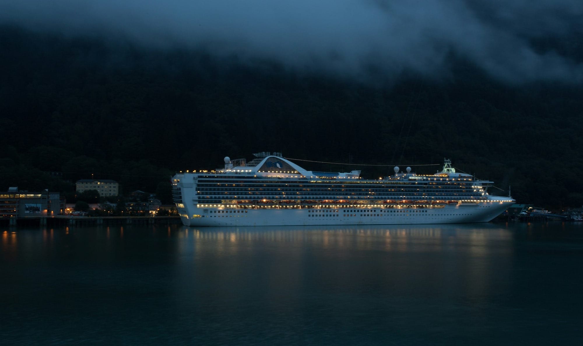 photo of white cruise ship during nighttime