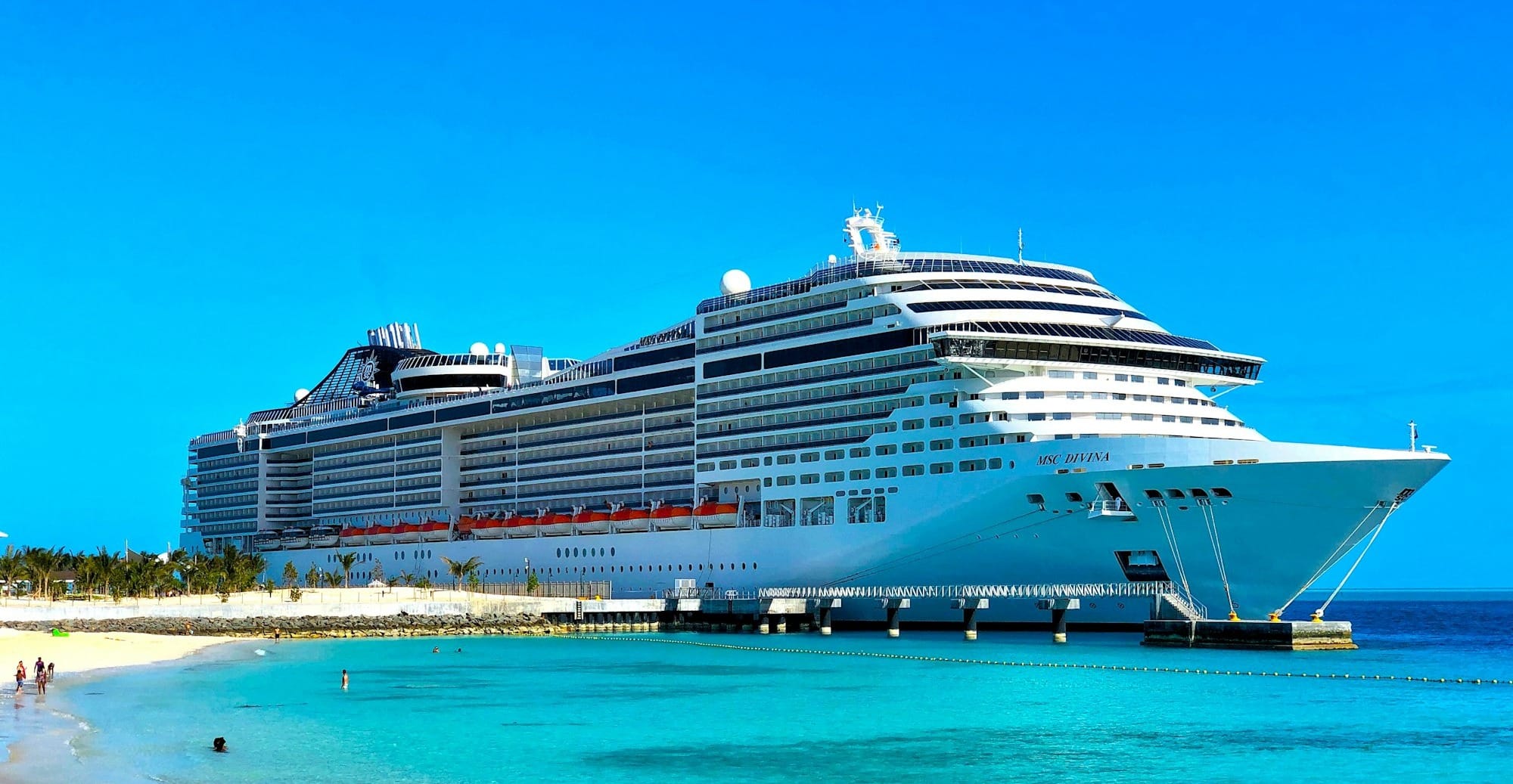 white cruise ship on sea during daytime