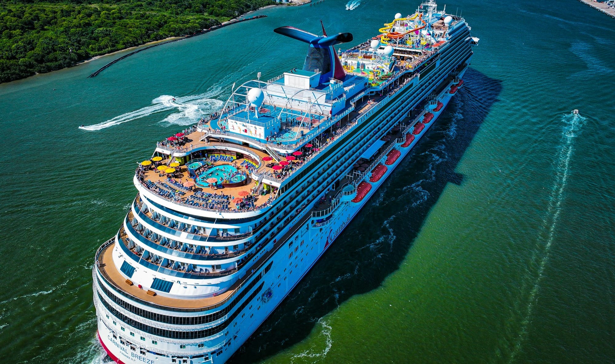 a large cruise ship in the middle of a body of water