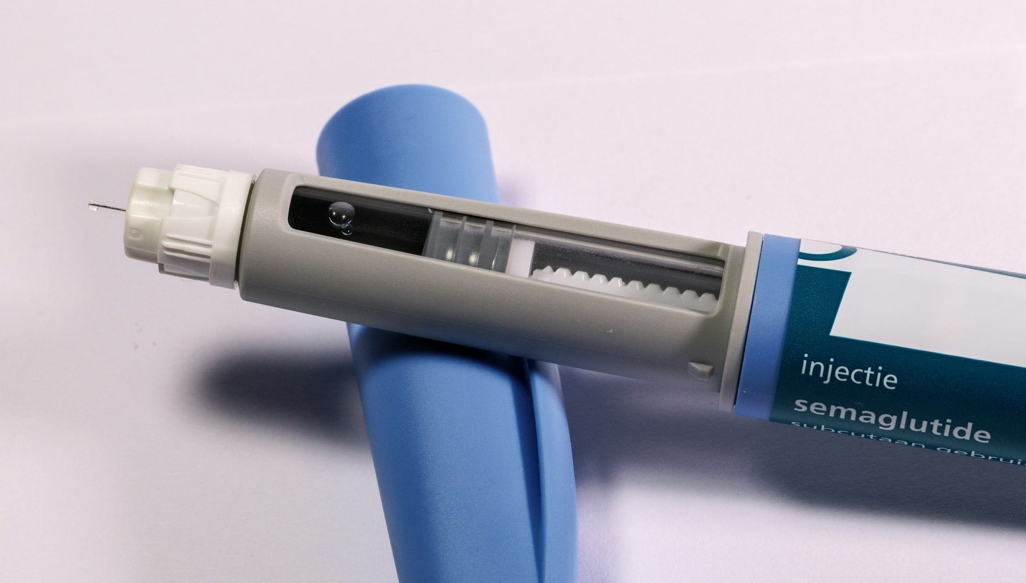 A semaglutide injection pen is shown.
