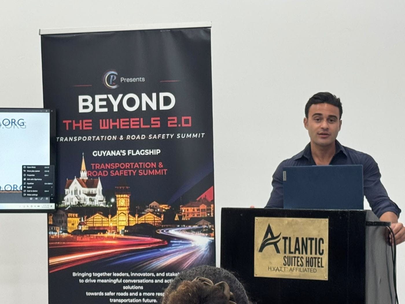 A speaker addresses the launch audience.