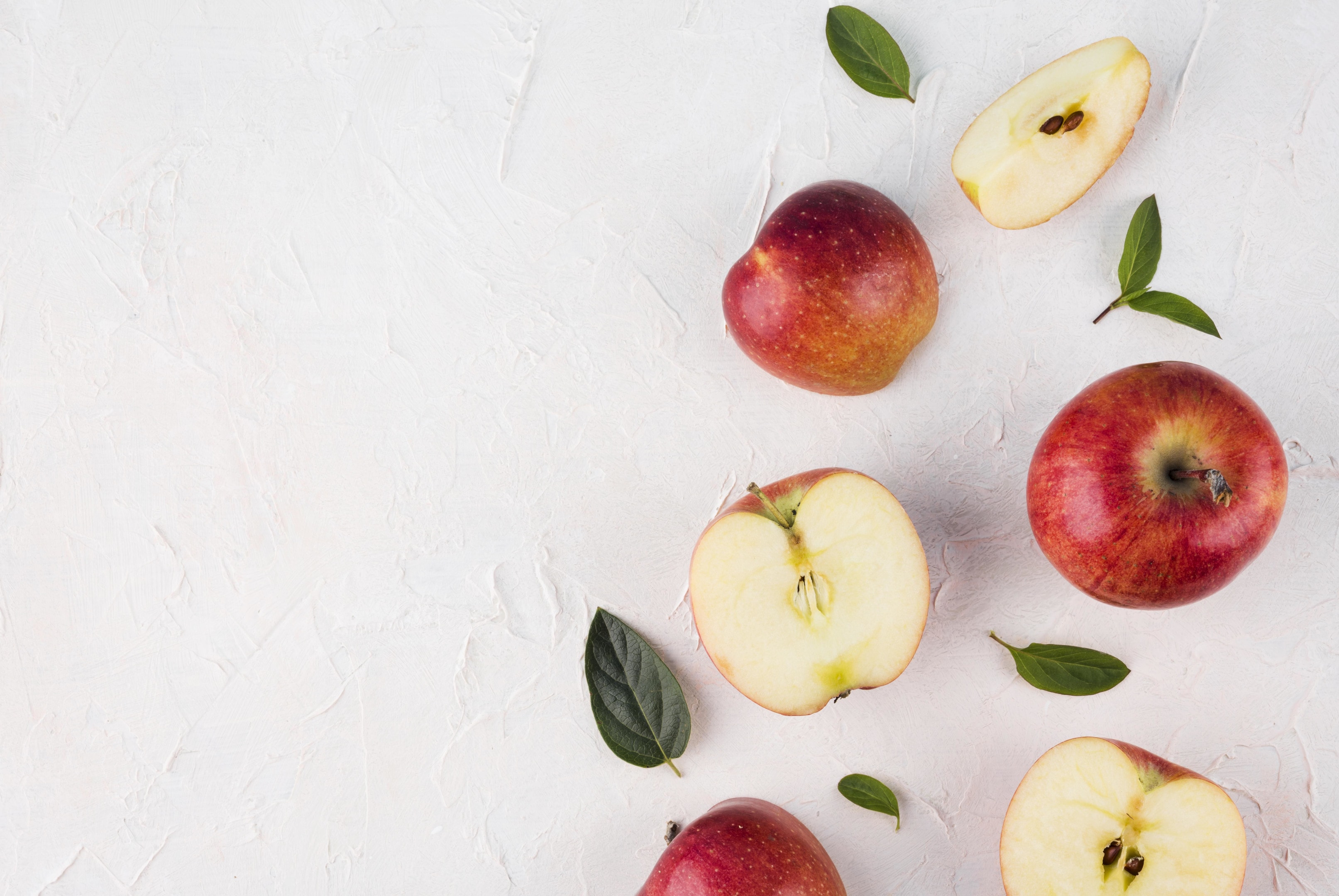 Assortment of apples on light background