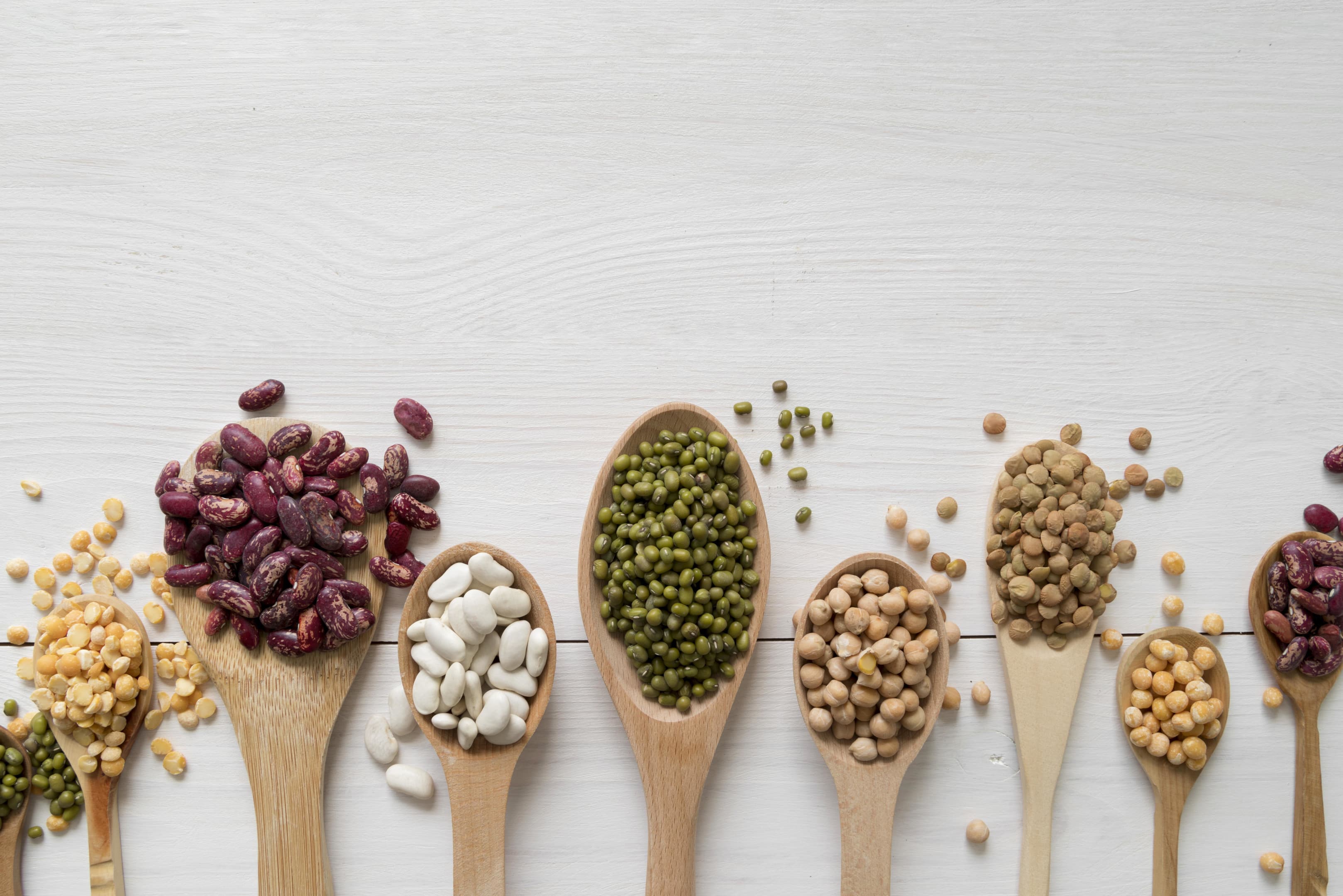 Beans arrangement on wooden table