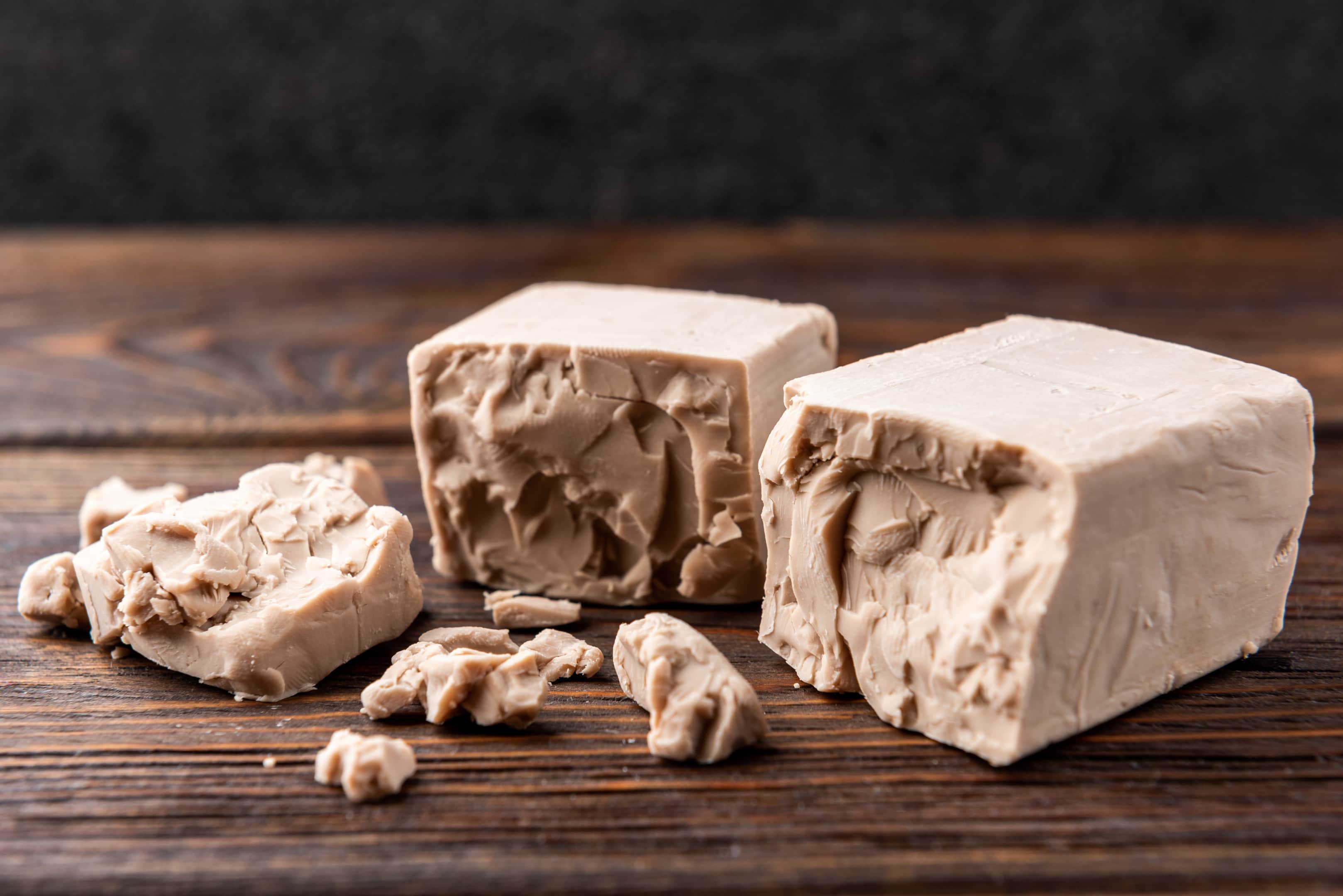 Brewers yeast on wooden table