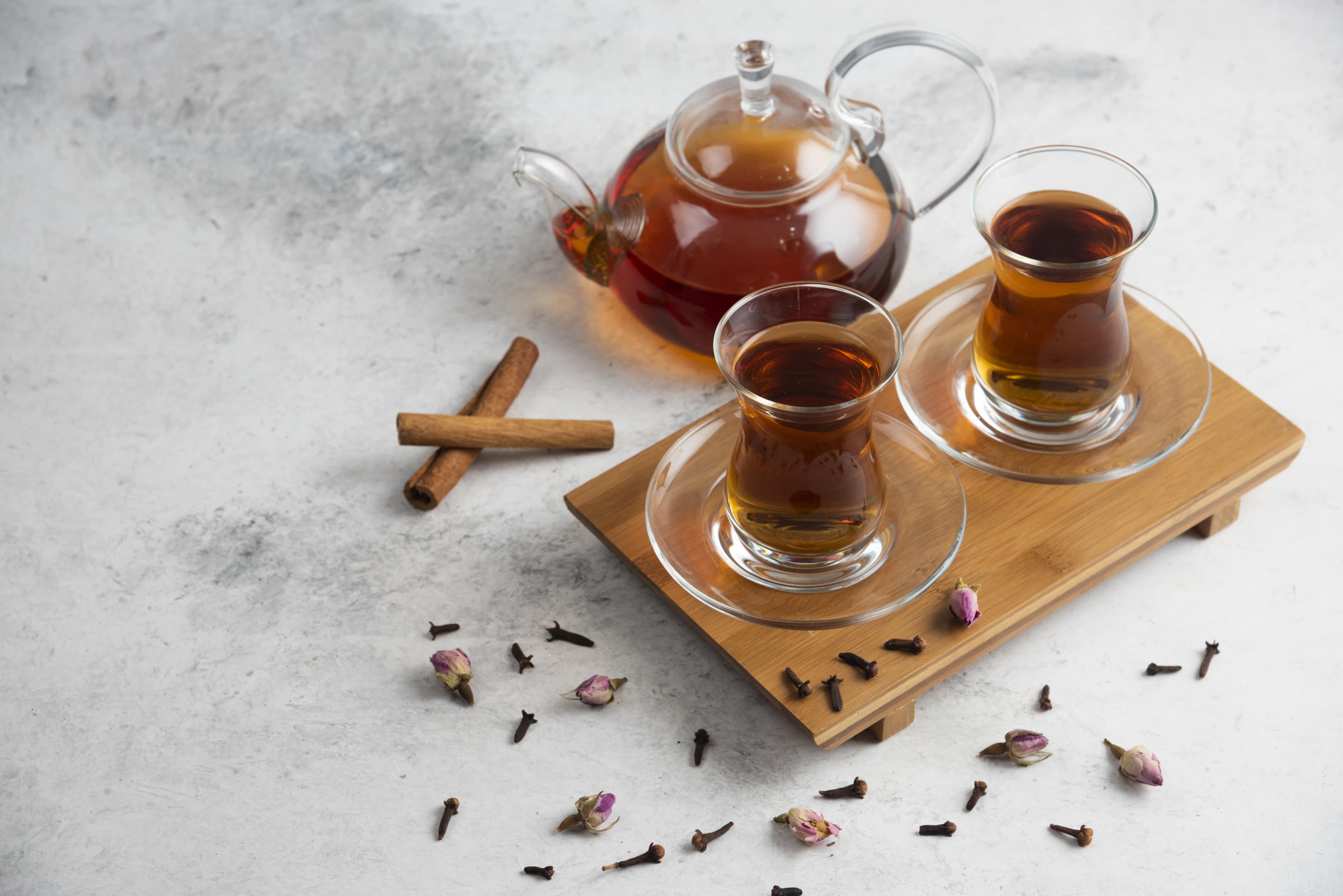 Cups of tea with cloves