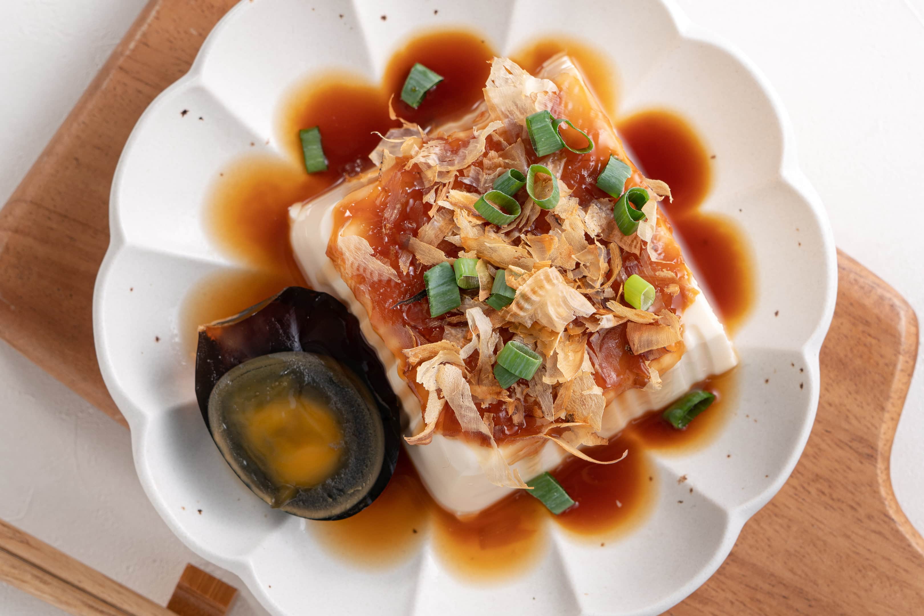 Delicious silken tofu with soy sauce bonito flakes topping