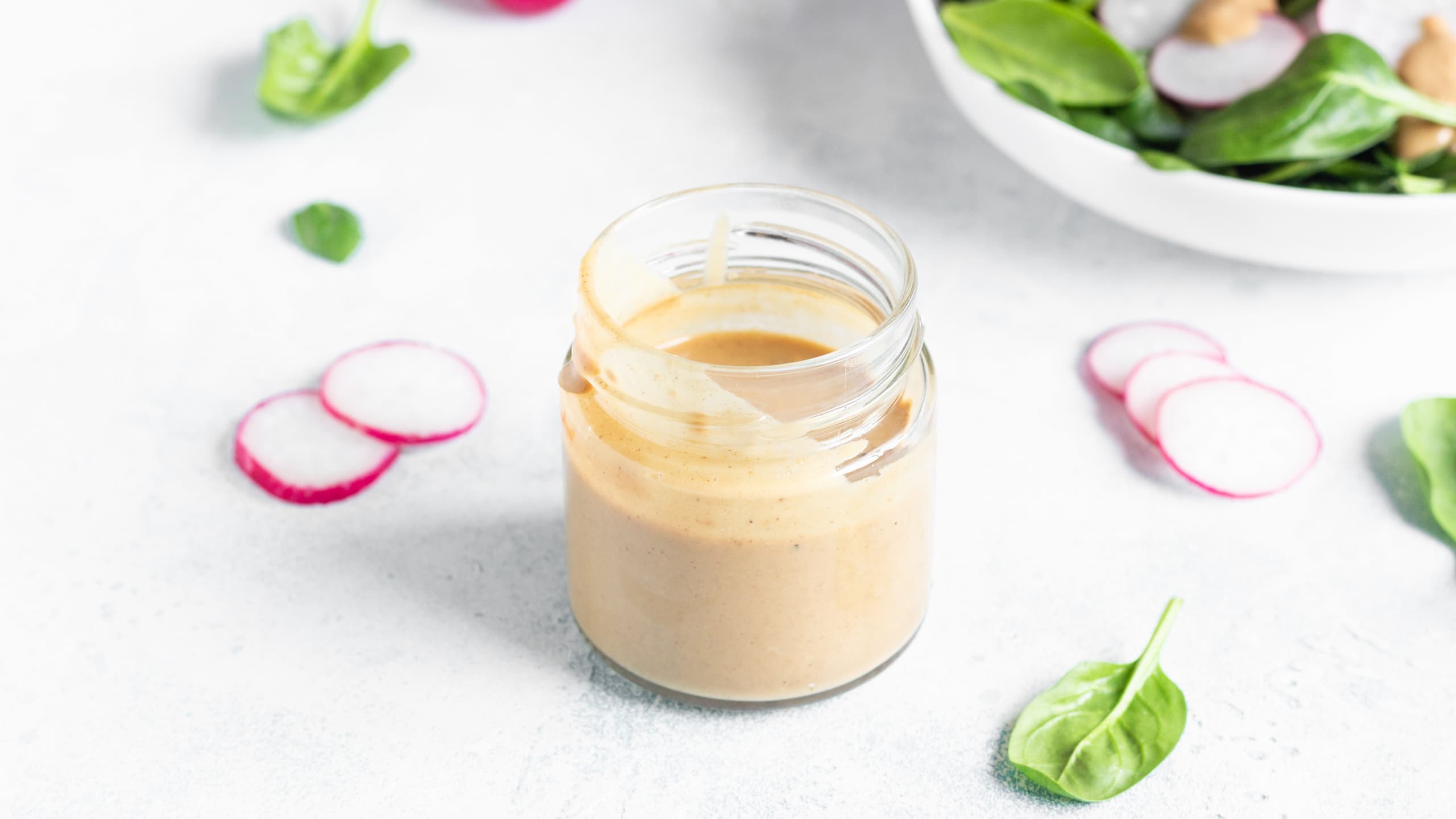 Jar of Benihana Yum Yum sauce with radish slices
