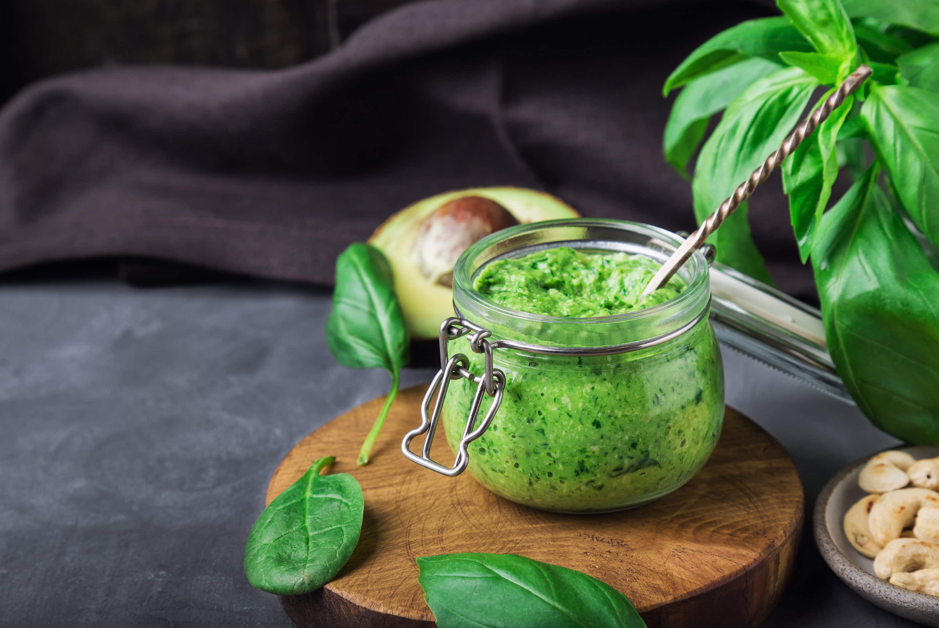Fresh vegan spinach pesto sauce with basil and pine nuts