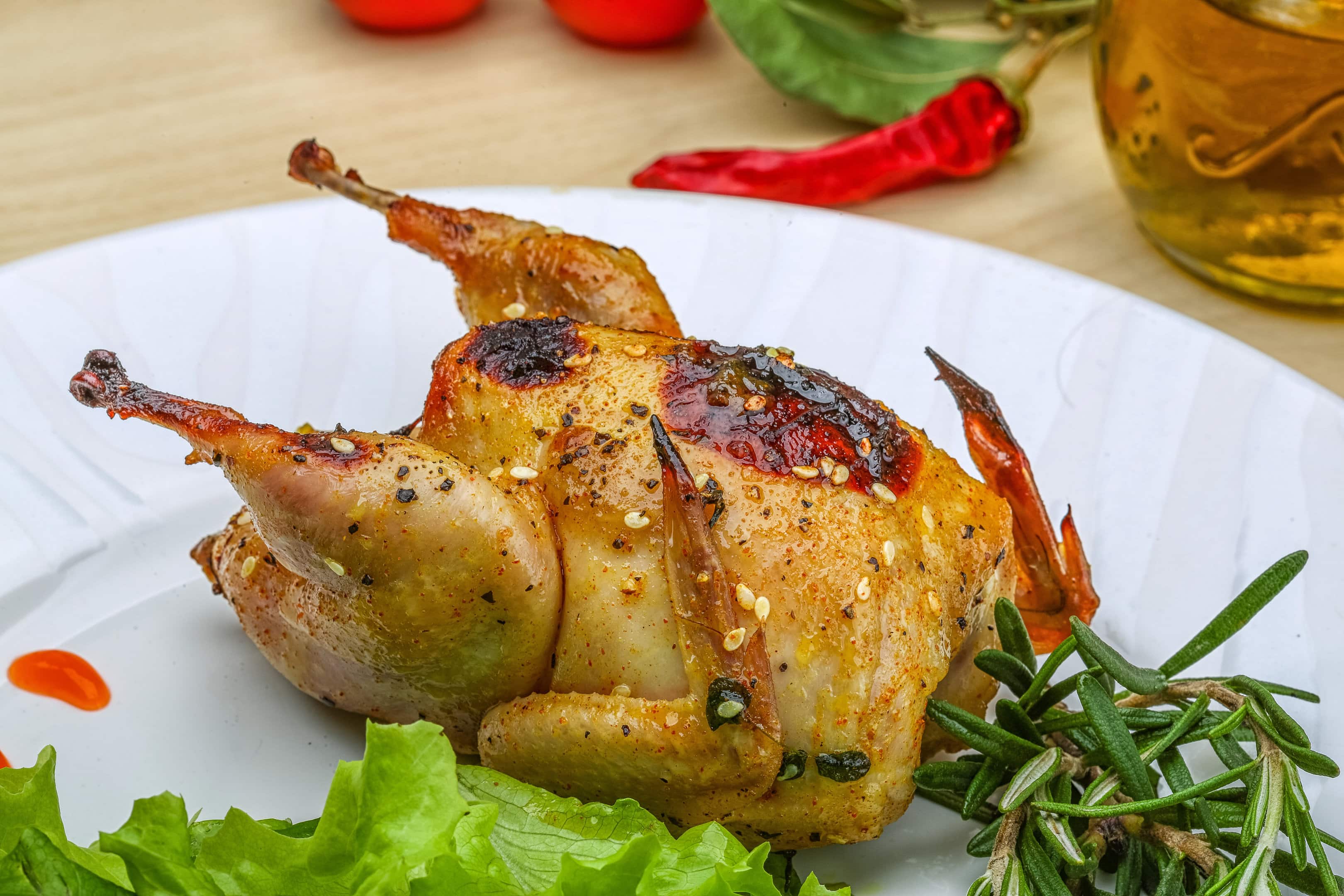 Homemade baked Cornish hen with lettuce