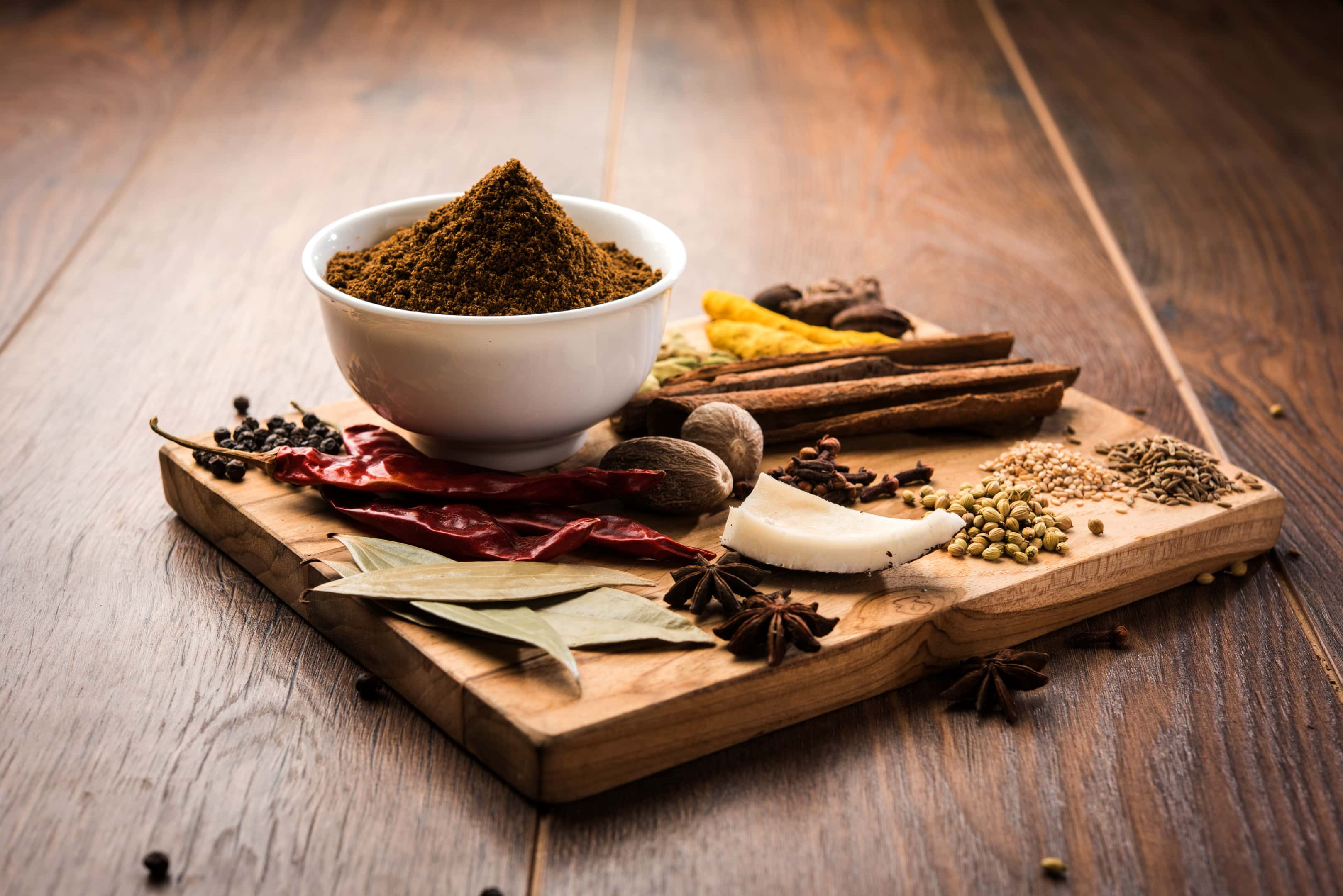 Kala jeera methi ajwain powder in a bowl with colourful spices