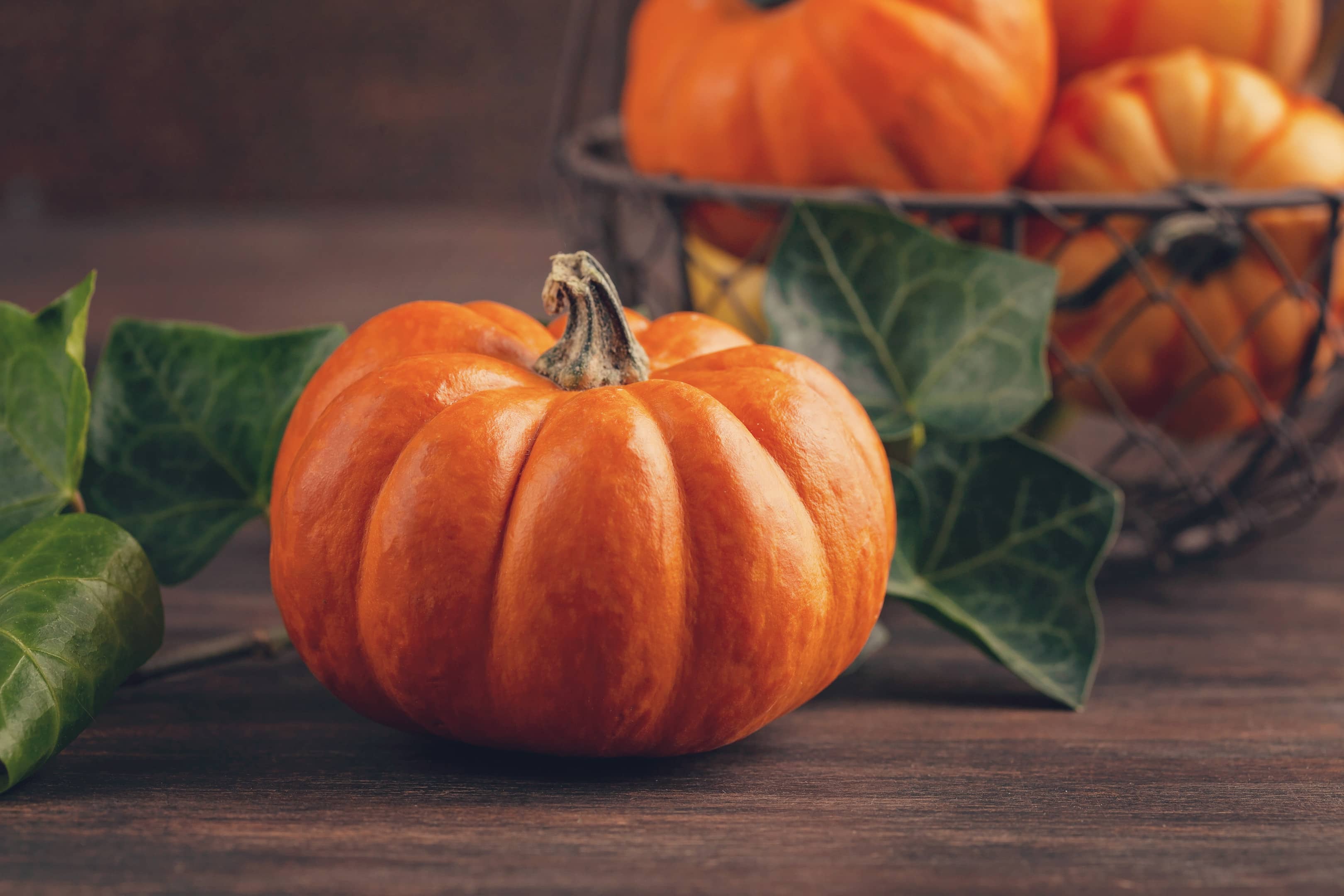 Pumpkins on wooden table