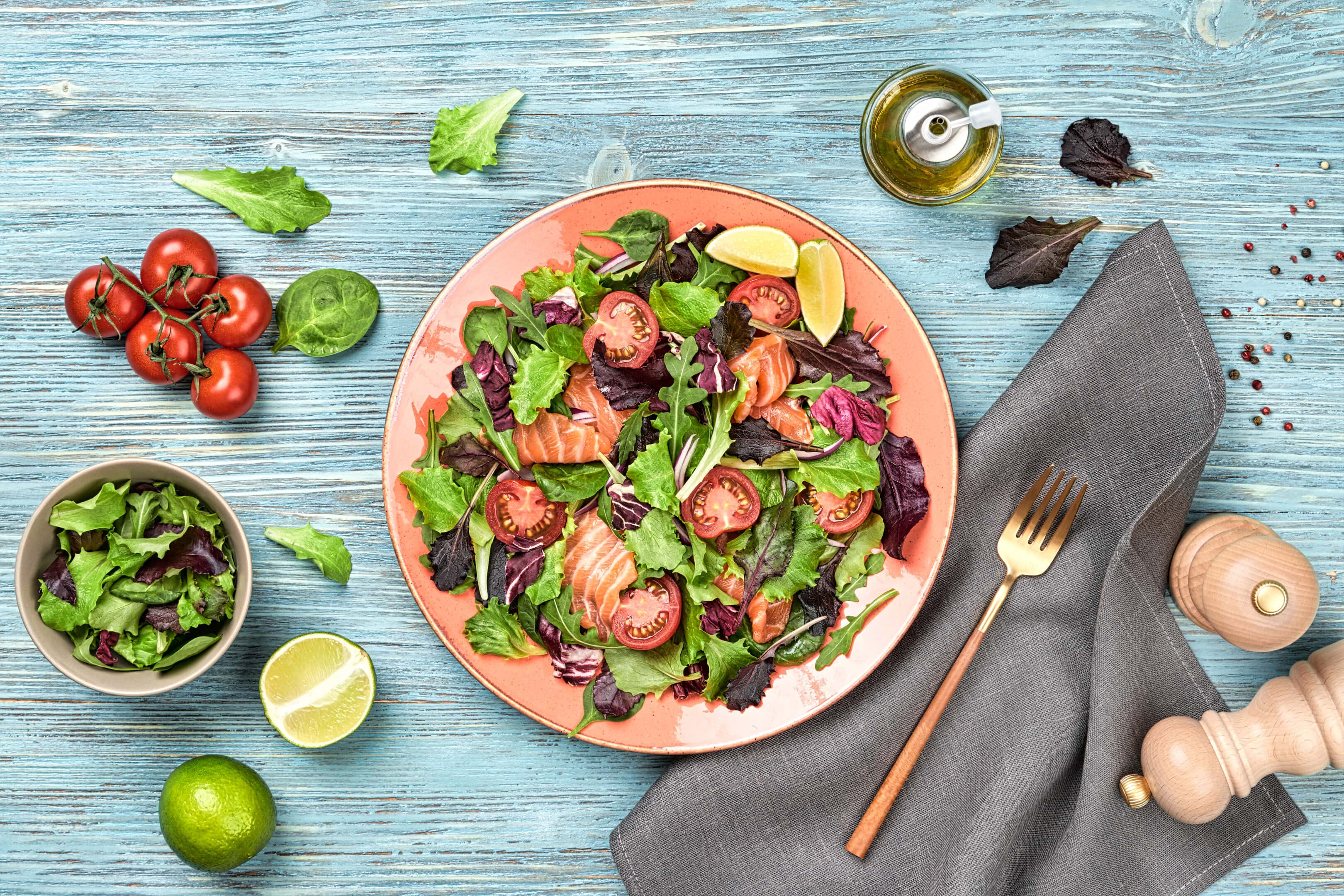 Salmon salad with cherry tomatoes and leafy greens