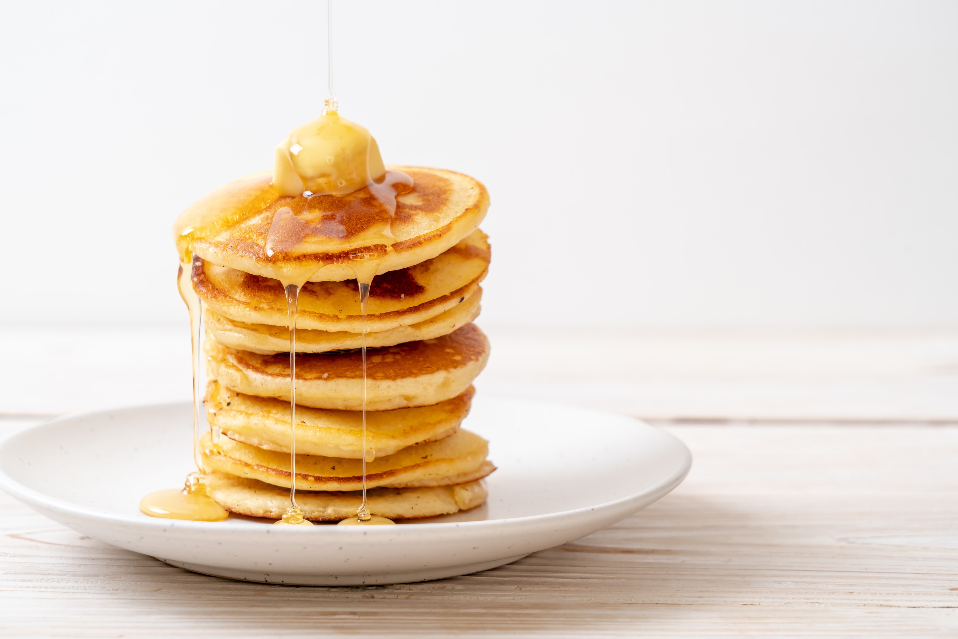 Stack of pancakes with maple syrup
