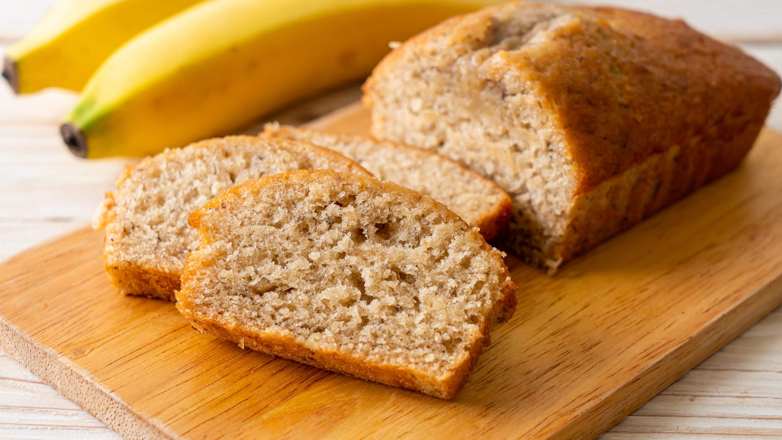Bob Evans banana bread loaf with slices and bananas