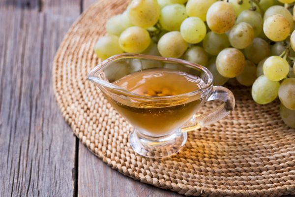 Balsamic vinegar and olive oil on wooden table
