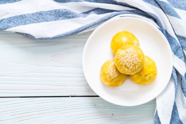 Caribbean conch fritters in white plate