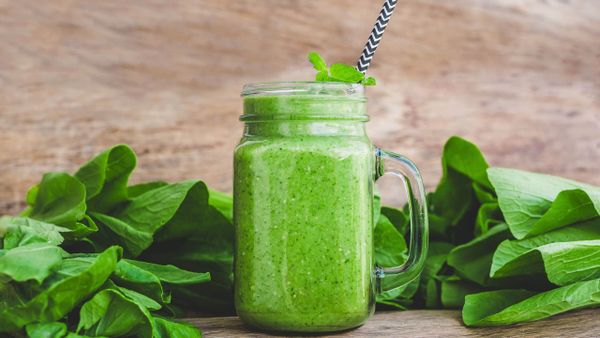 ultimate meal replacement smoothie filled with spinach, banana, and coconut milk