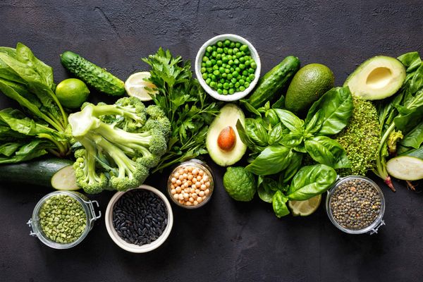 Various leafy green vegetables, beans and fruits
