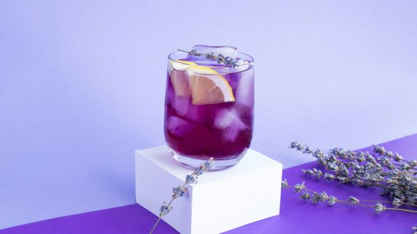 Violet sake with ice and lemon