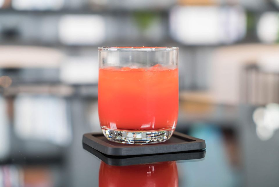 A glass of Hunch Punch cocktail