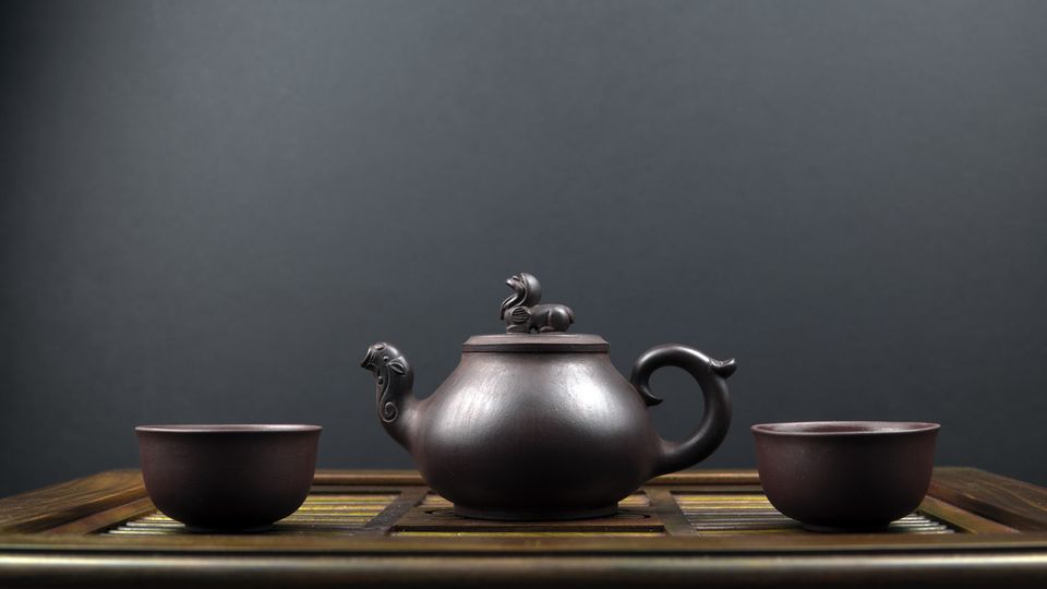 Ancient teapot with black soybean tea