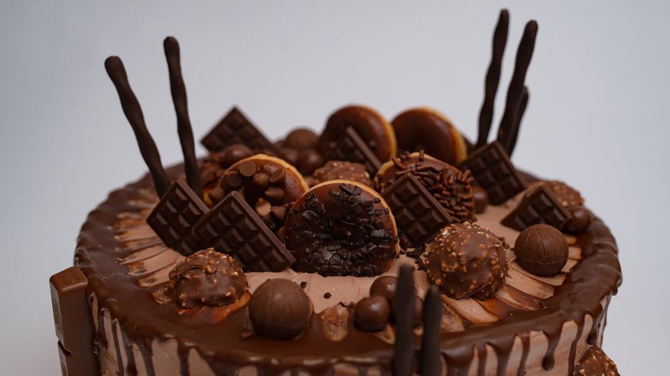 Creamy chocolate Hennessy cake decorated with candies