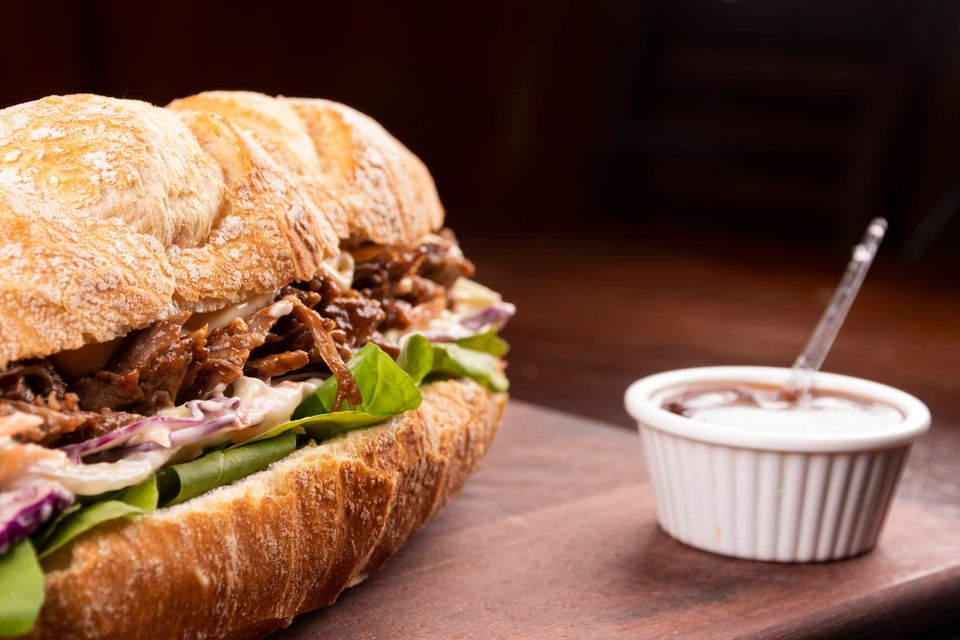 Delicious Portillo's Italian beef sandwich with barbecue sauce