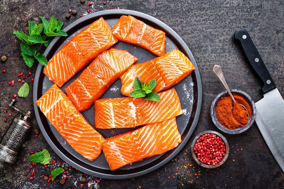 Fresh raw salmon filets on a plate