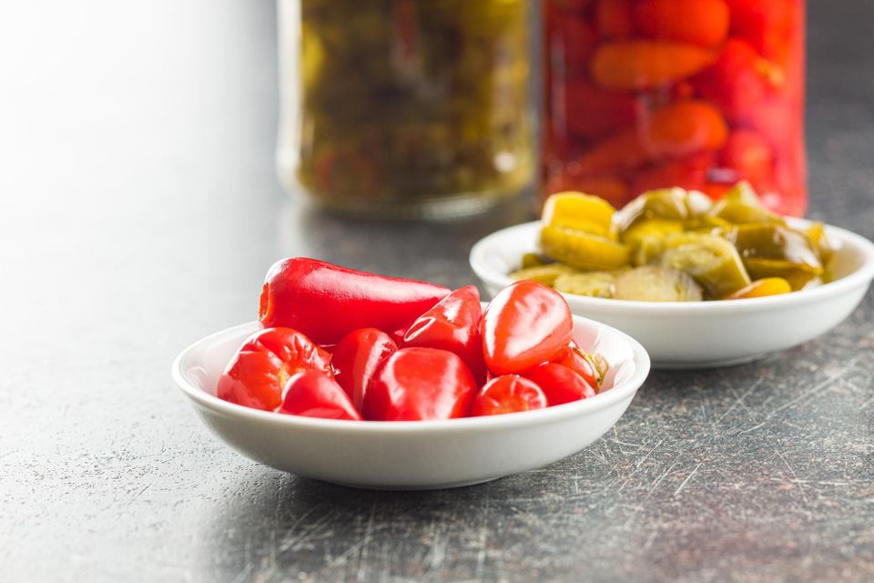 Pickled pepperoncini peppers in a bowl