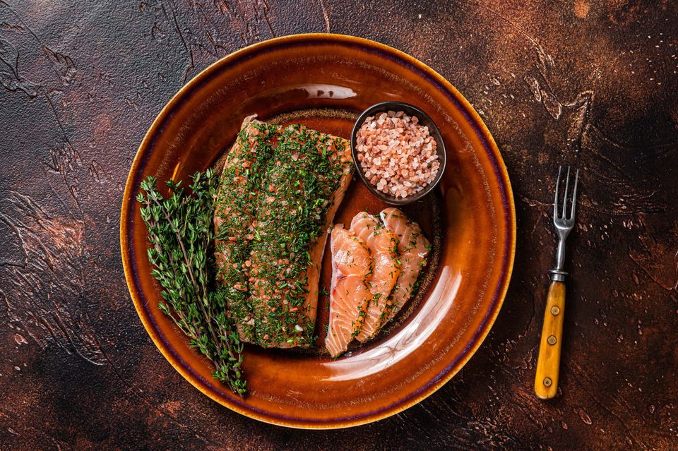 Wild salmon gravlax cured with dill and pink salt