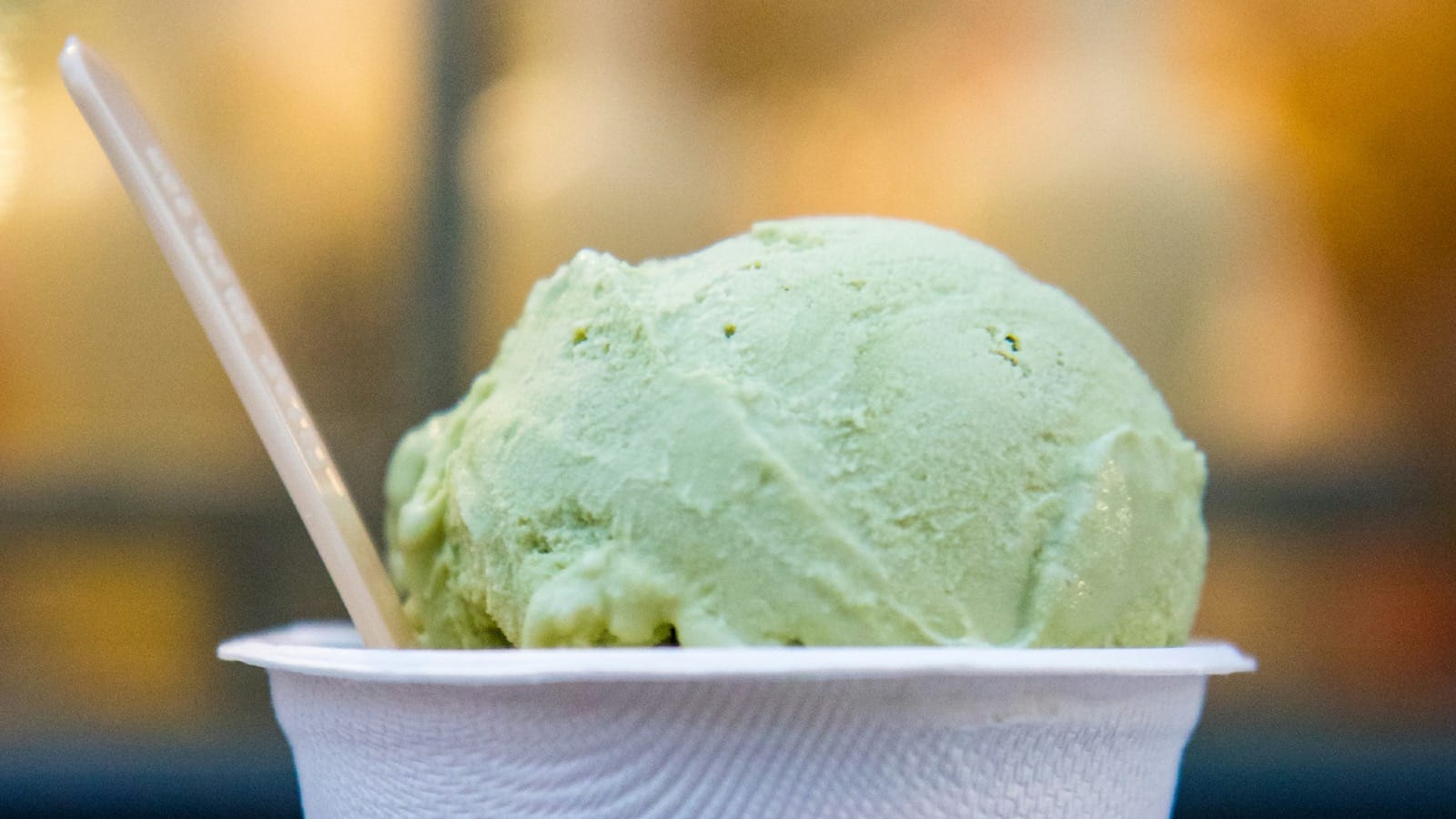 selective focus photo of cup of ice cream