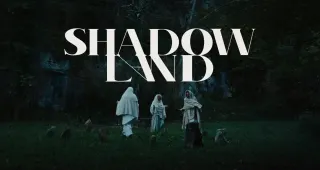 Key art for the documentary Shadowland featuring three robed women in a circle