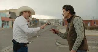 Joaquin Phoenix and Pedro Pascal in the film Eddington
