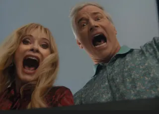Barbara Crampton finally figures out what's in the box in the movie Grind.